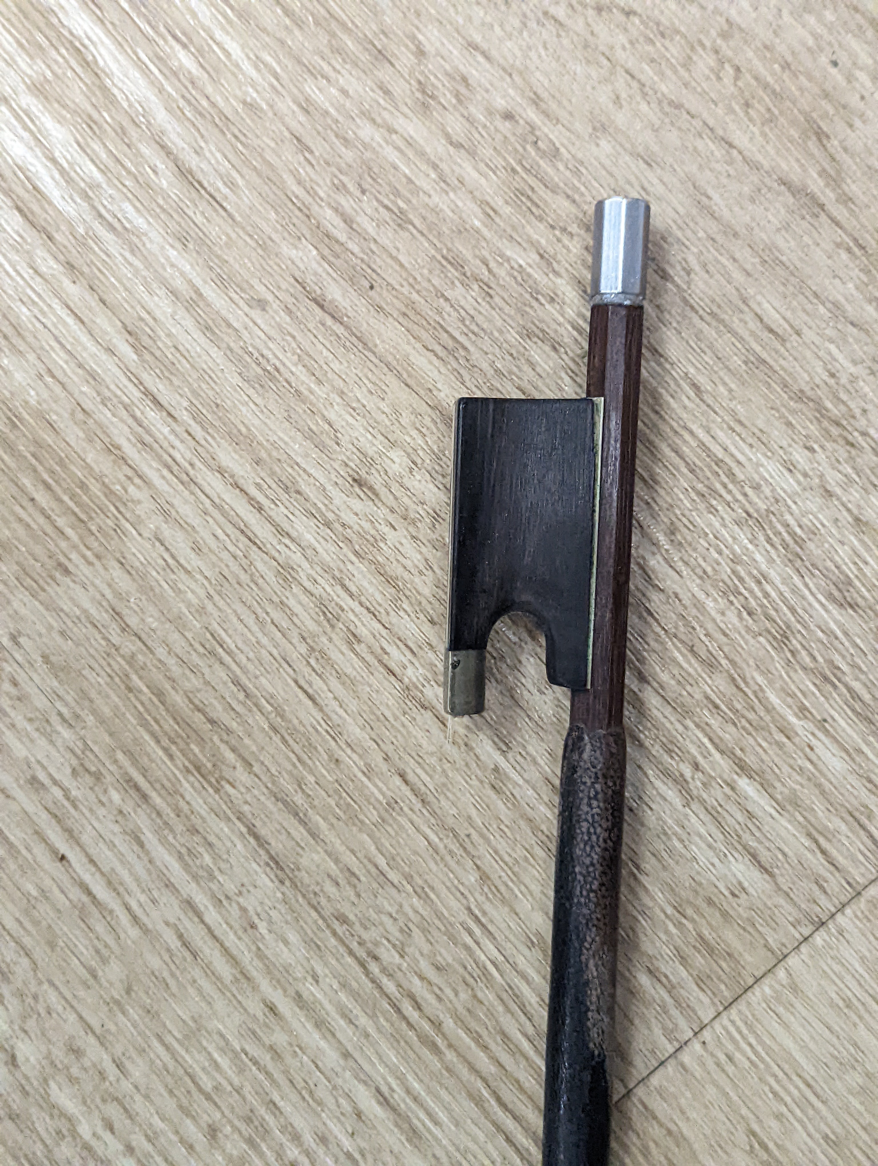 A late 19th century German violin and two bows, cased